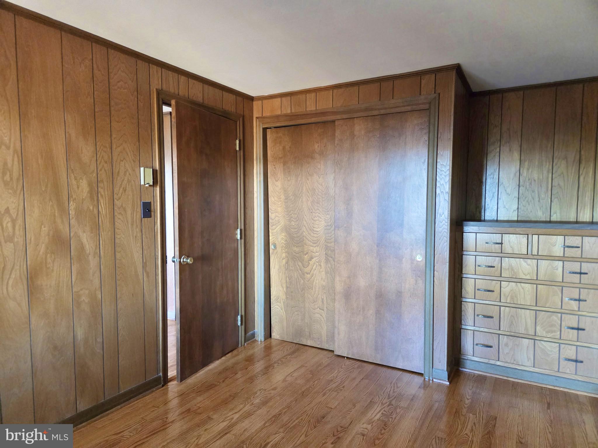 5489 Rude Avenue Tilghman, MD 21671 - Photo 48 of 65 a view of an empty room with wooden floor