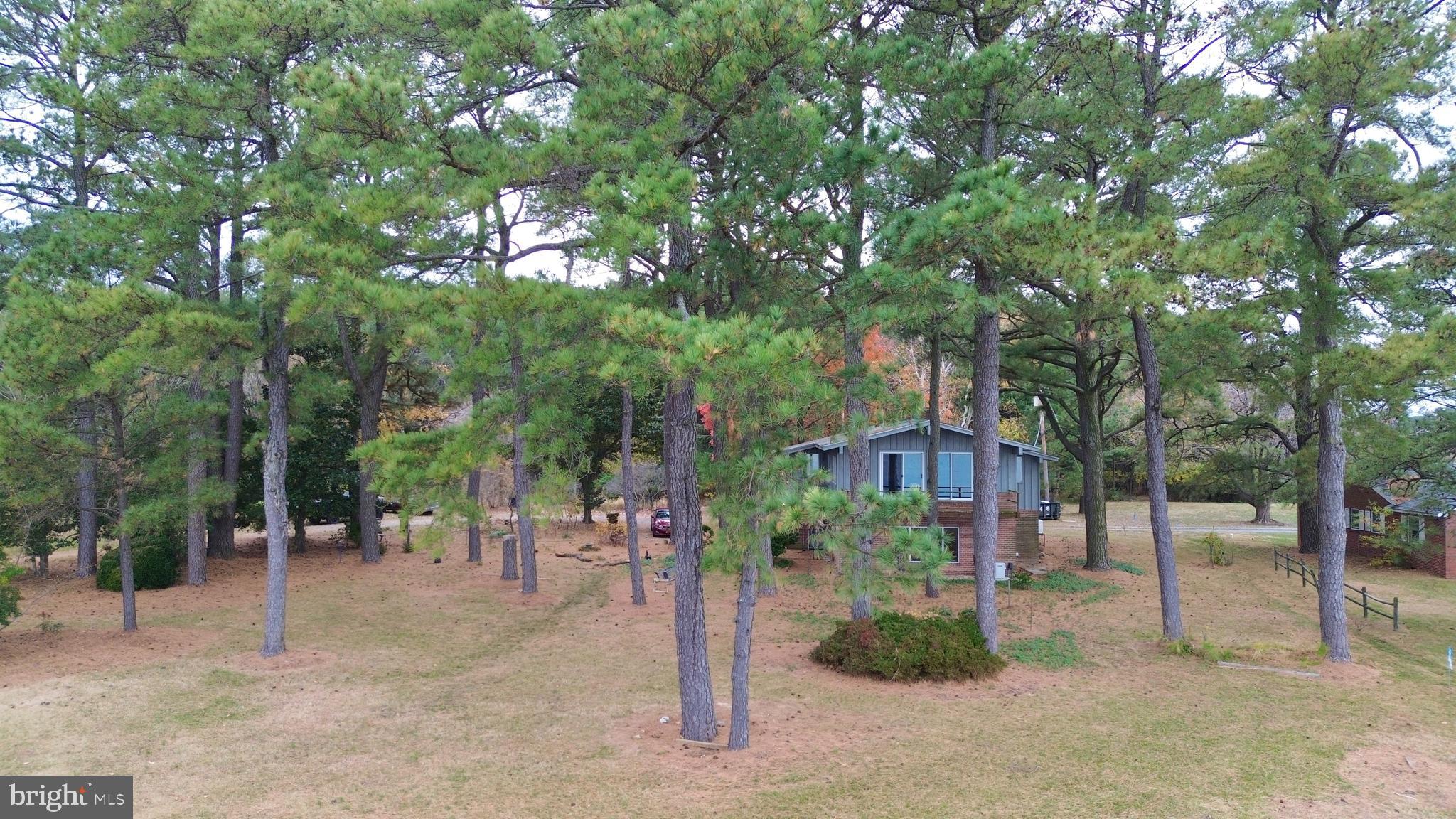 5489 Rude Avenue Tilghman, MD 21671 - Photo 5 of 65 a view of a chairs in a backyard