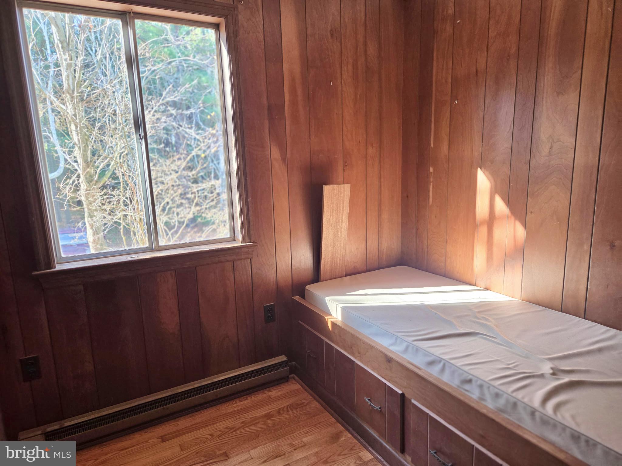 5489 Rude Avenue Tilghman, MD 21671 - Photo 51 of 65 a bedroom with a bed and a window