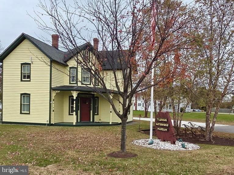 5489 Rude Avenue Tilghman, MD 21671 - Photo 61 of 65 a front view of a house with a yard