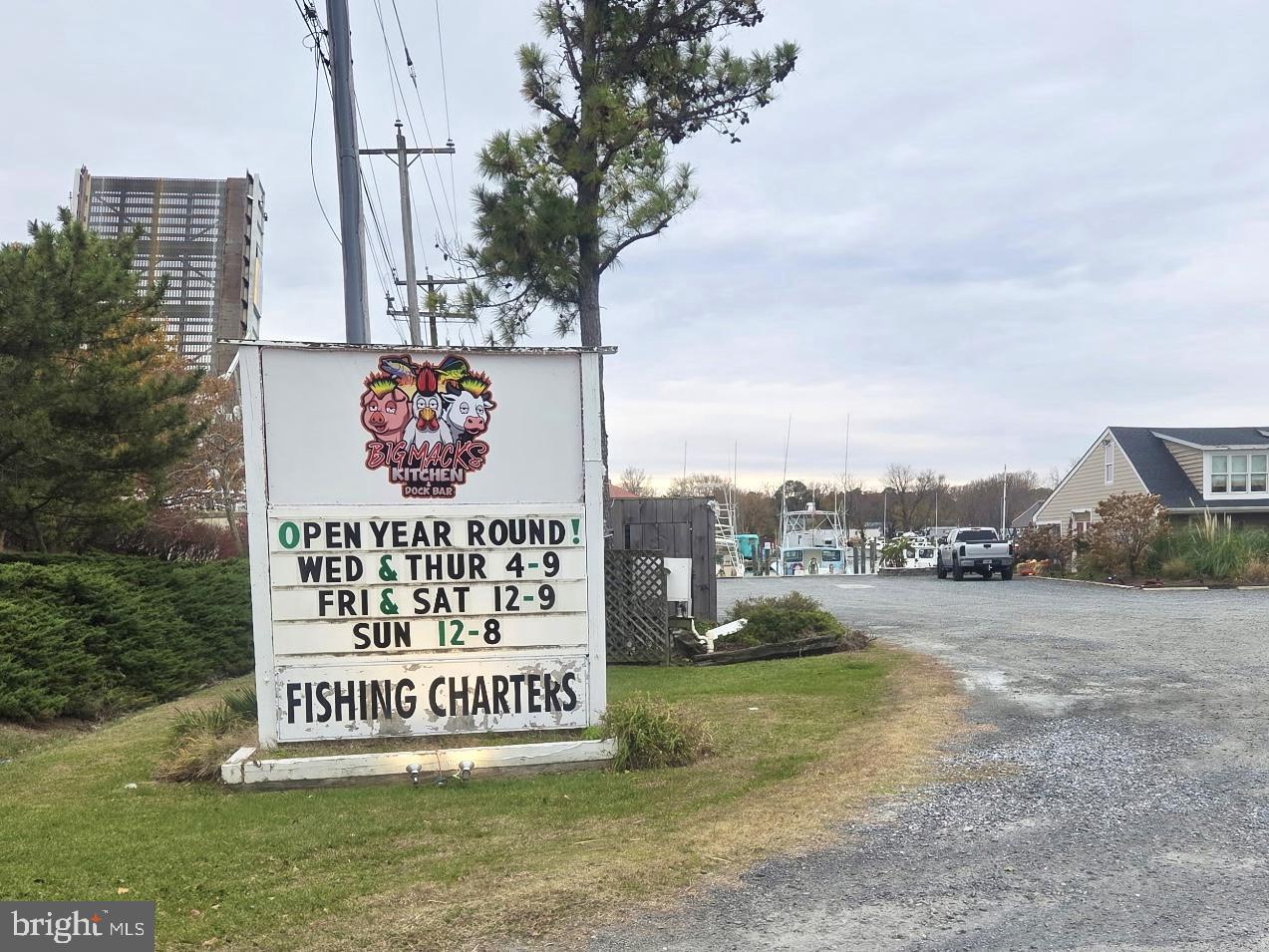 5489 Rude Avenue Tilghman, MD 21671 - Photo 64 of 65 a sign on the side of the road