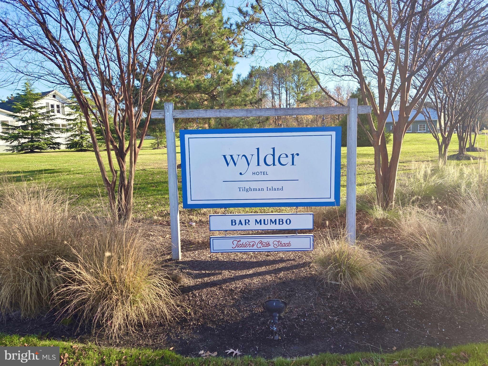 5489 Rude Avenue Tilghman, MD 21671 - Photo 65 of 65 a sign on the side of the road