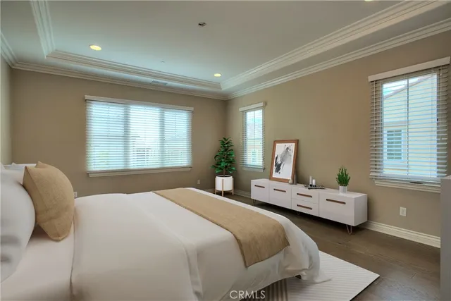 a spacious bathroom with a shower a sink and mirror