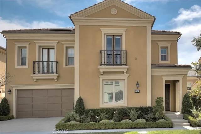 a view of a house with backyard sitting area and garden