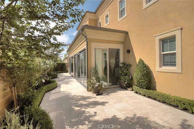 a swimming pool with outdoor seating and yard