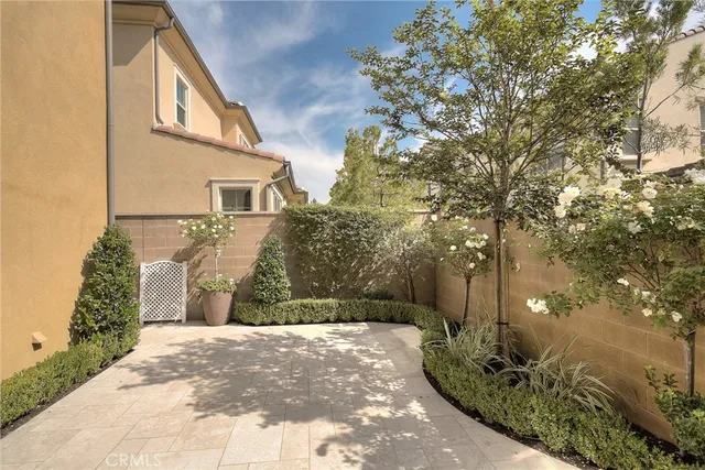 a view of swimming pool with chairs and tables