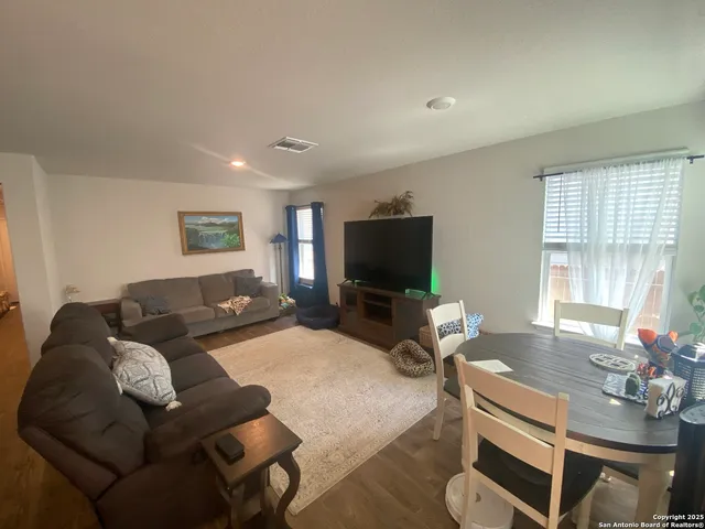 a bedroom with a bed and a desk