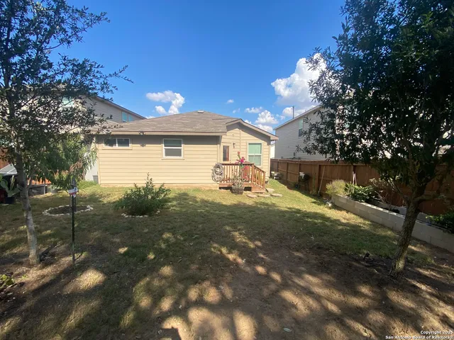 an empty room with wooden floor