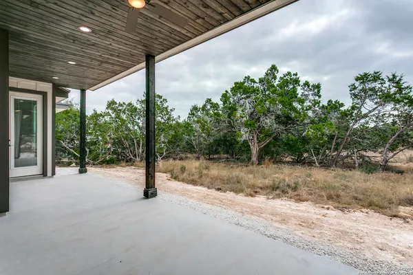 a view of a backyard of a house