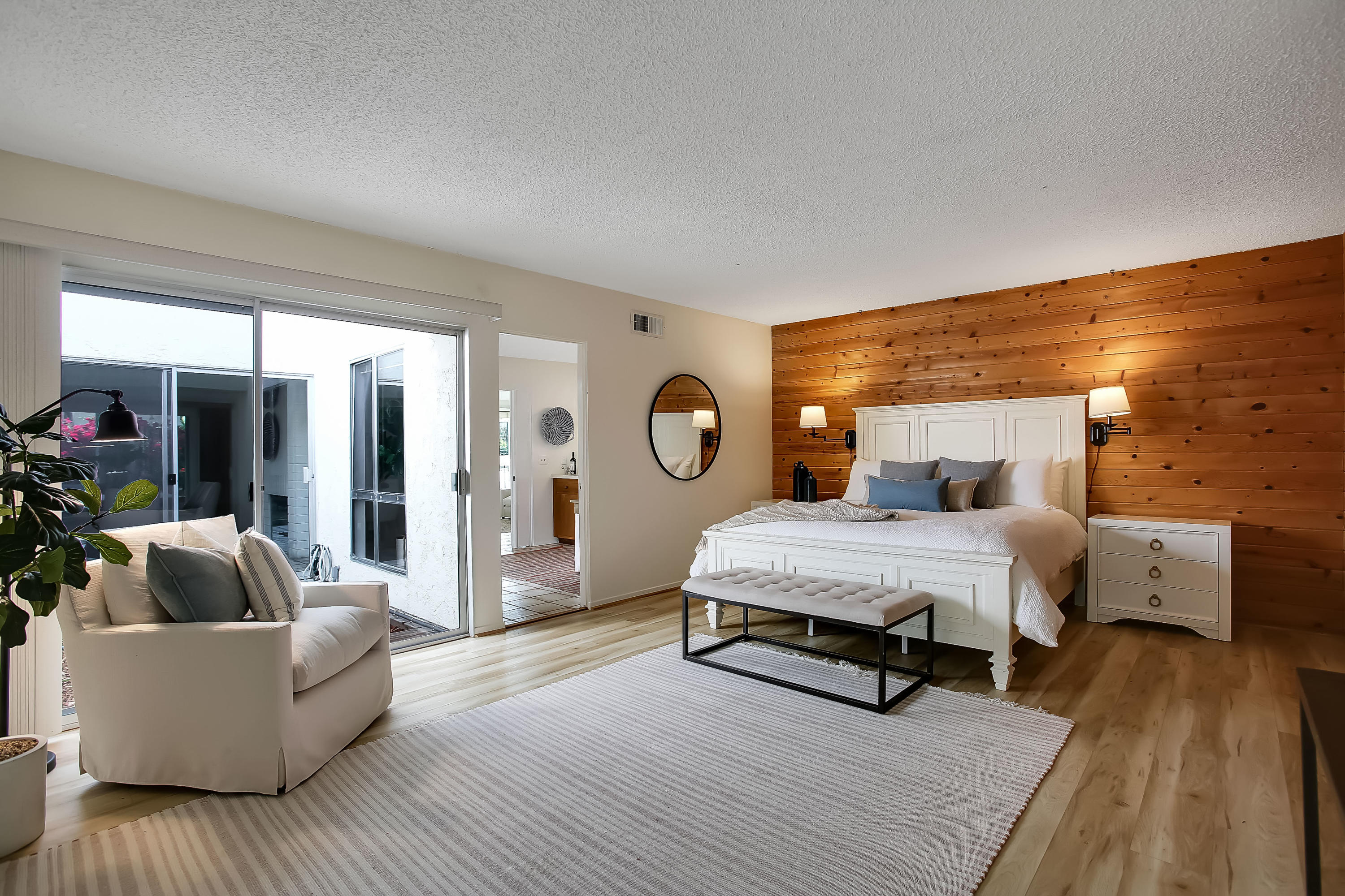 7206 Georgetown Road Goleta, CA 93117 - Photo 11 of 34 a bedroom with furniture and wooden floor
