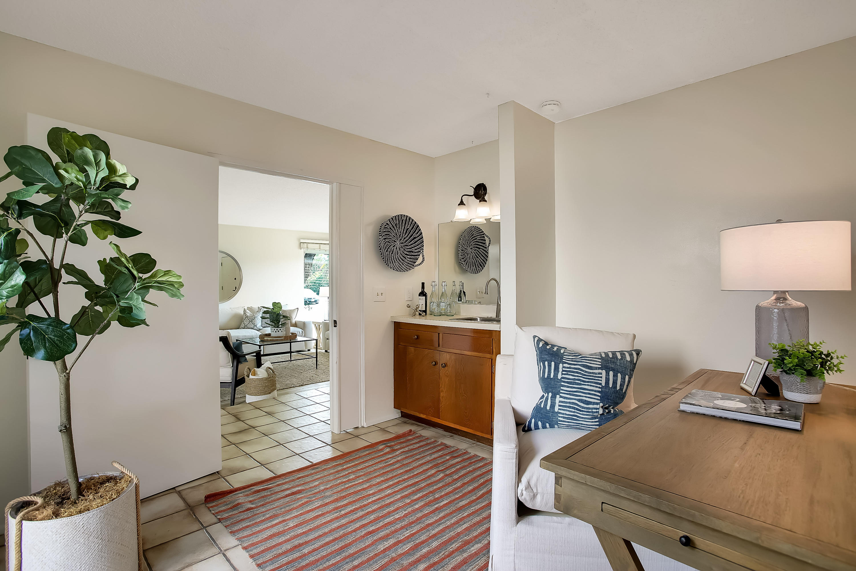 7206 Georgetown Road Goleta, CA 93117 - Photo 19 of 34 a living room with furniture and a potted plant