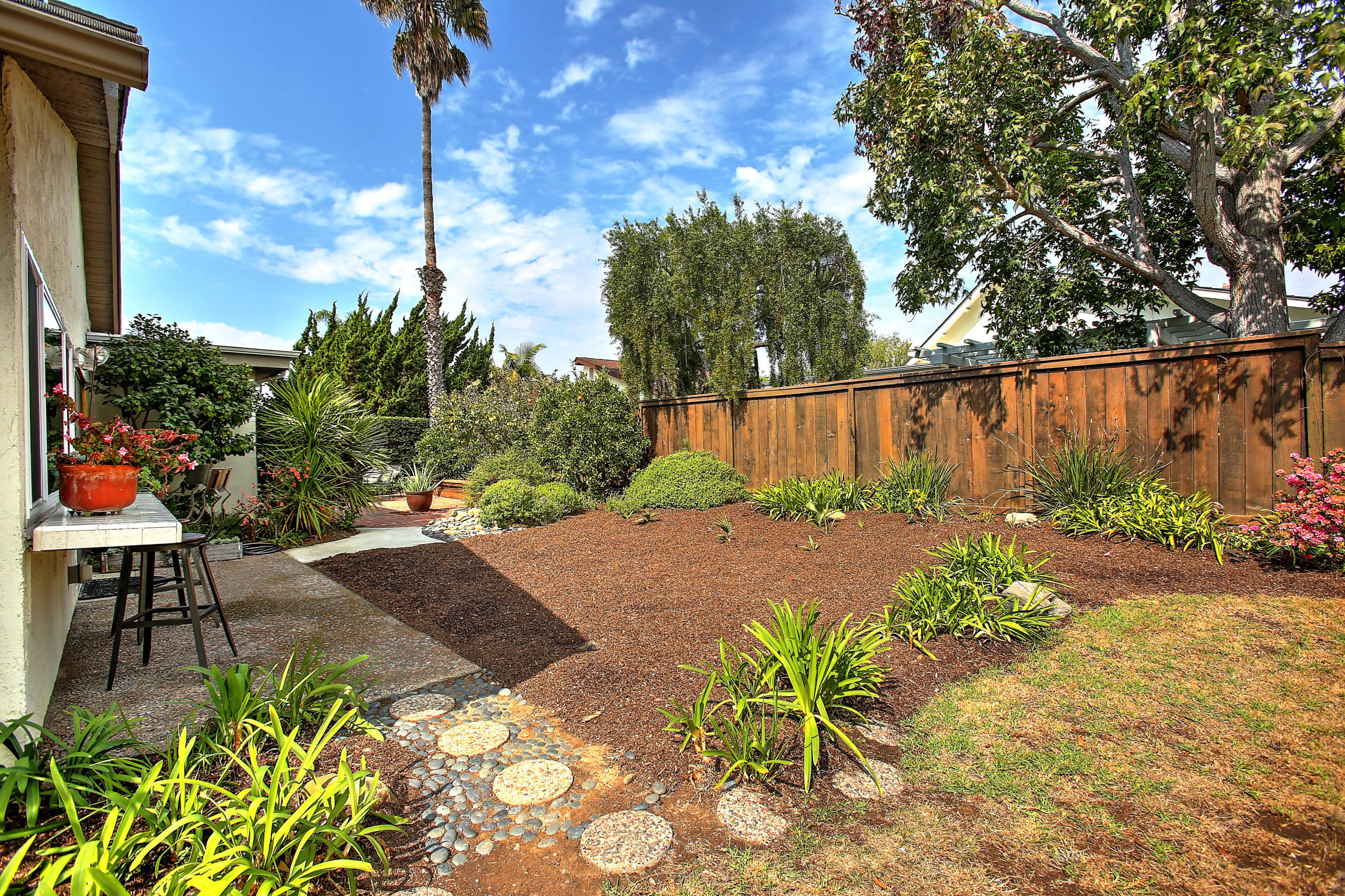 7206 Georgetown Road Goleta, CA 93117 - Photo 22 of 34 a garden view with a seating space