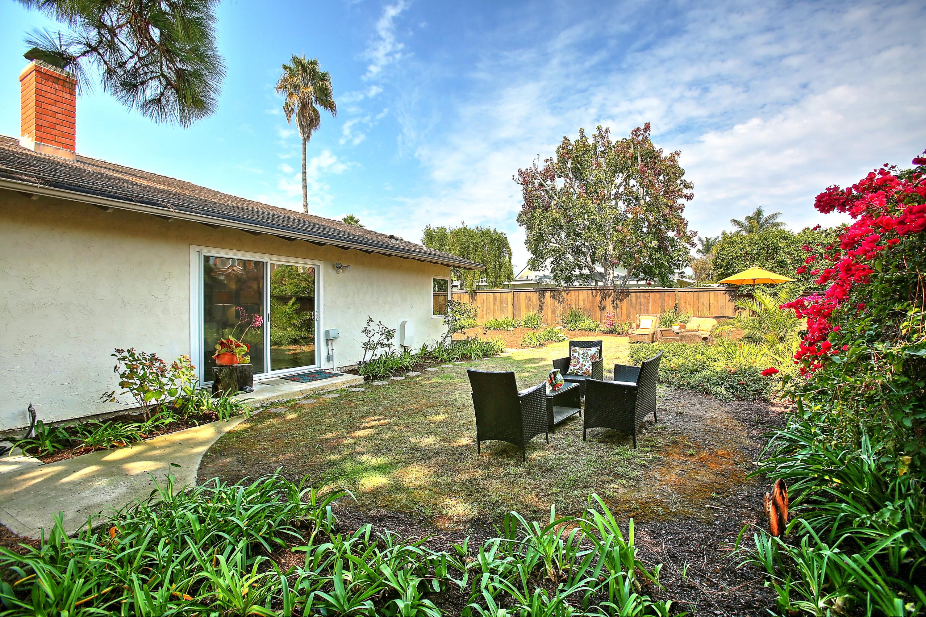 7206 Georgetown Road Goleta, CA 93117 - Photo 29 of 34 a view of a house with backyard and sitting area