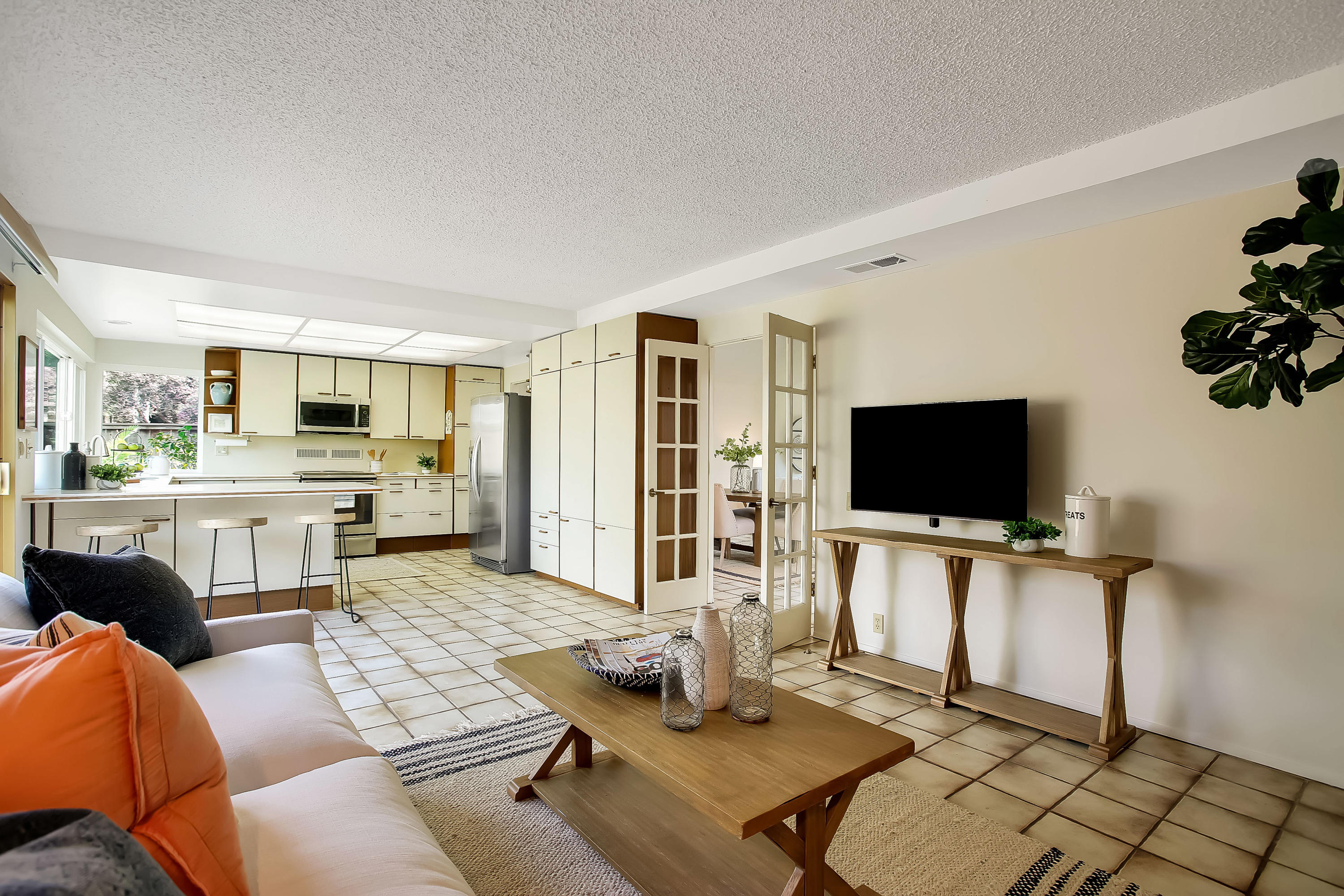7206 Georgetown Road Goleta, CA 93117 - Photo 7 of 34 a living room with furniture and a flat screen tv