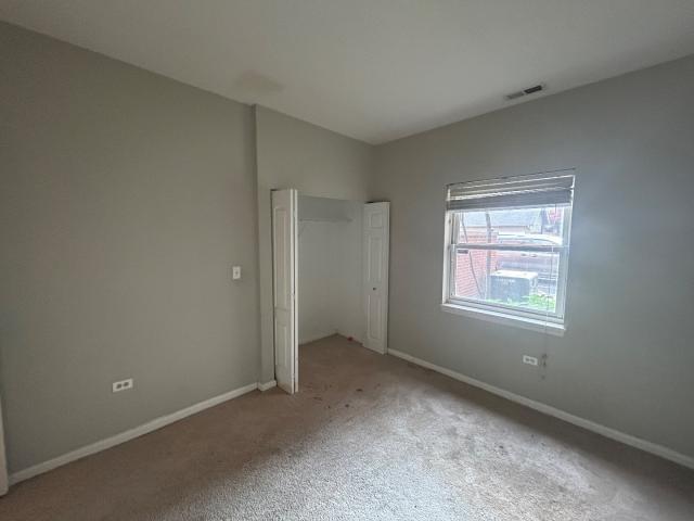 1461 South Halsted Street, Unit 1B Chicago, IL 60607 - Photo 13 of 20 an empty room with windows