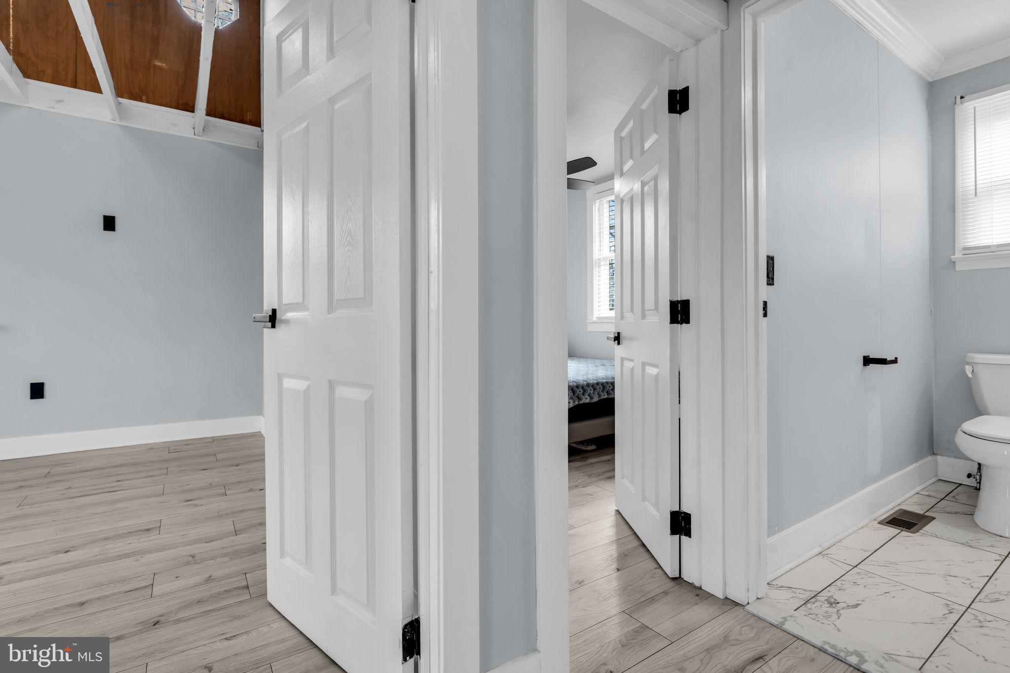 116 Hough Street Pemberton, NJ 08068 - Photo 20 of 25 a very nice looking room with wooden floor and a bathroom