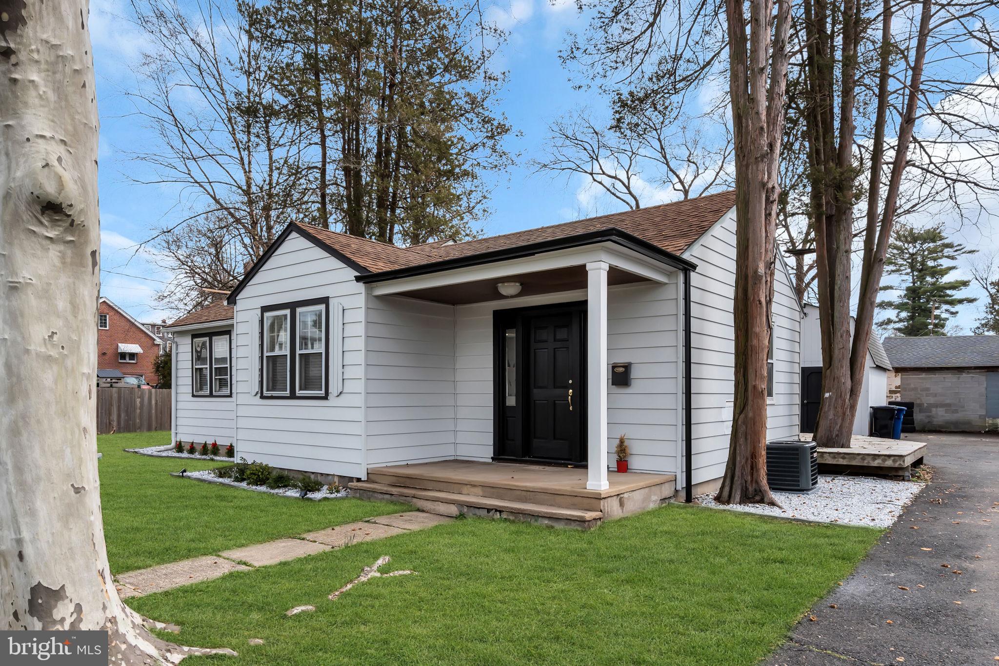 116 Hough Street Pemberton, NJ 08068 - Photo 2 of 25 a front view of a house with a garden