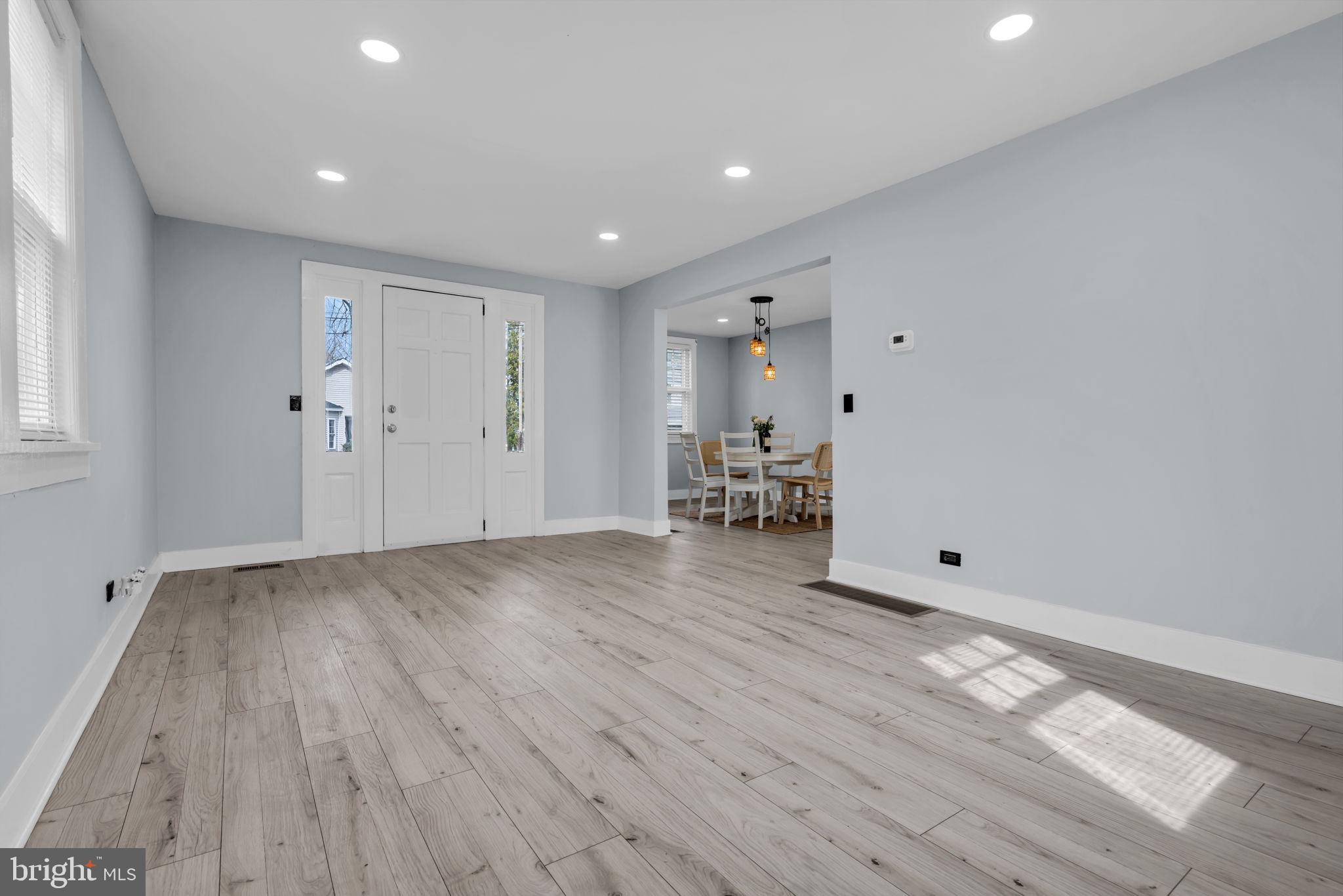 116 Hough Street Pemberton, NJ 08068 - Photo 3 of 25 a view of empty room with wooden floor and window
