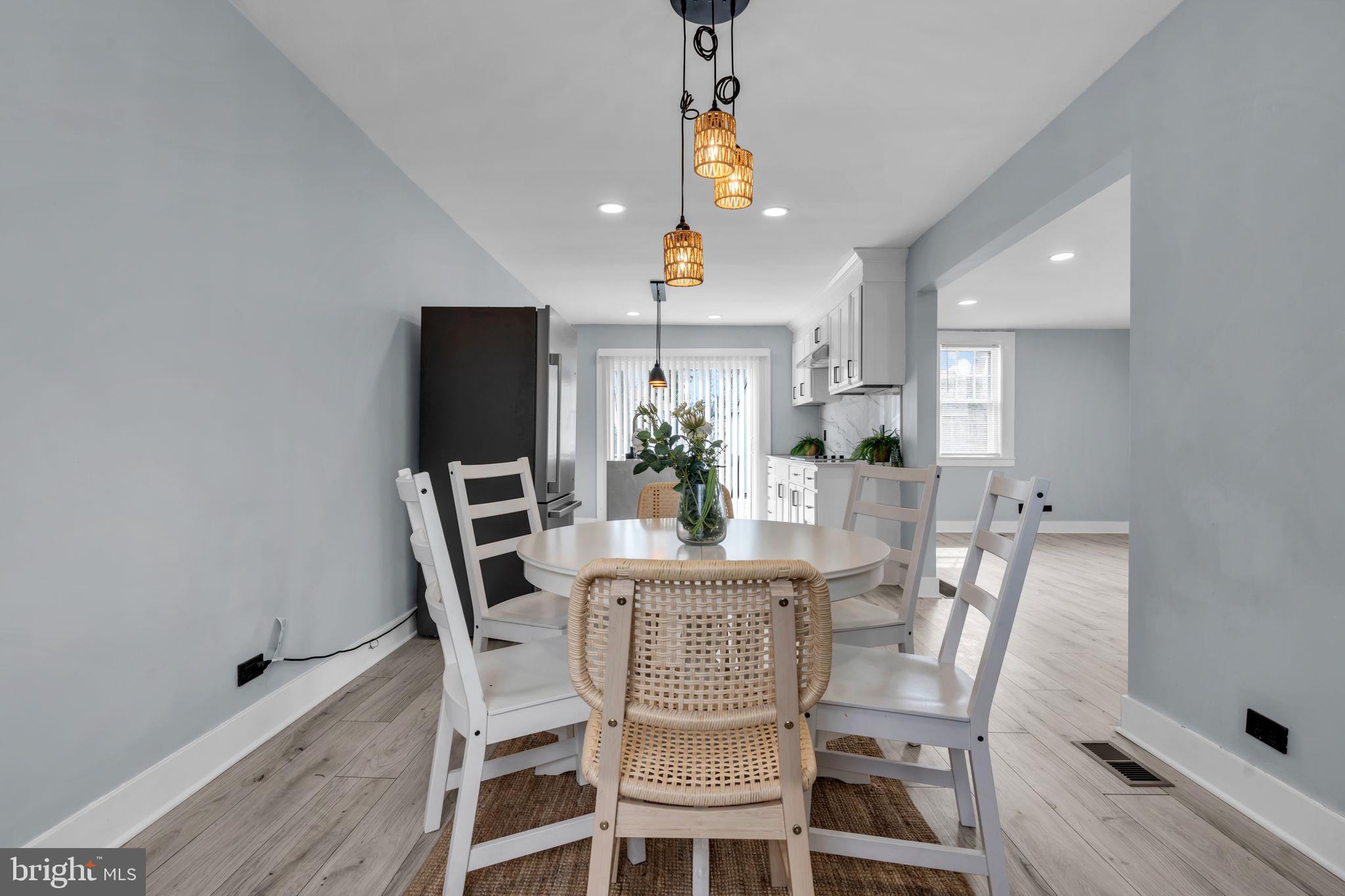 116 Hough Street Pemberton, NJ 08068 - Photo 7 of 25 a view of a dining room with furniture and wooden floor
