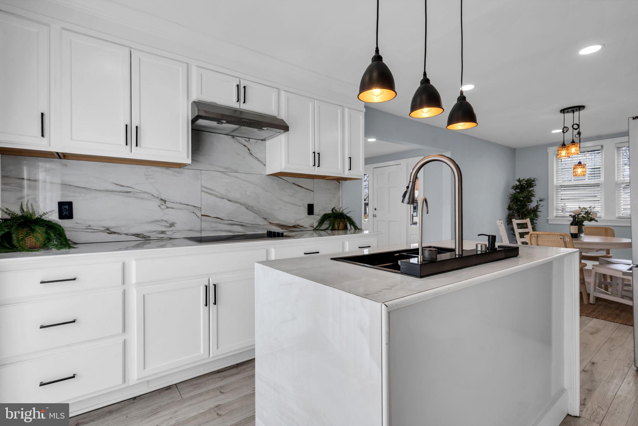116 Hough Street Pemberton, NJ 08068 - Photo 10 of 25 a kitchen with stainless steel appliances granite countertop a sink a stove and cabinets