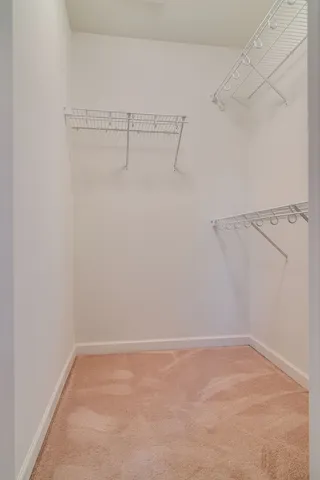 a view of a room with racks on the wall