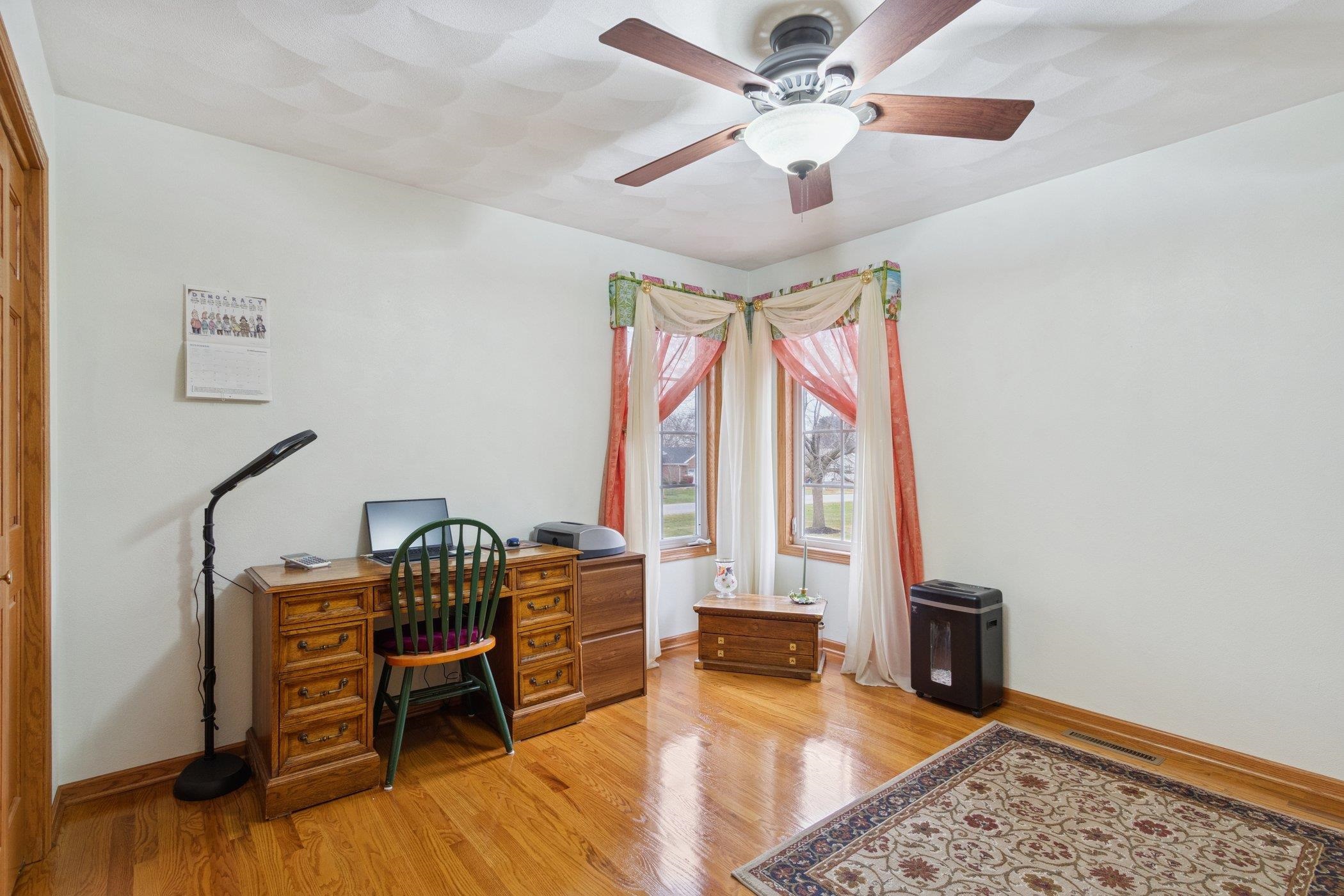 638 Merrion Road Roscoe, IL 61073 - Photo 14 of 64 a living room with furniture and a window