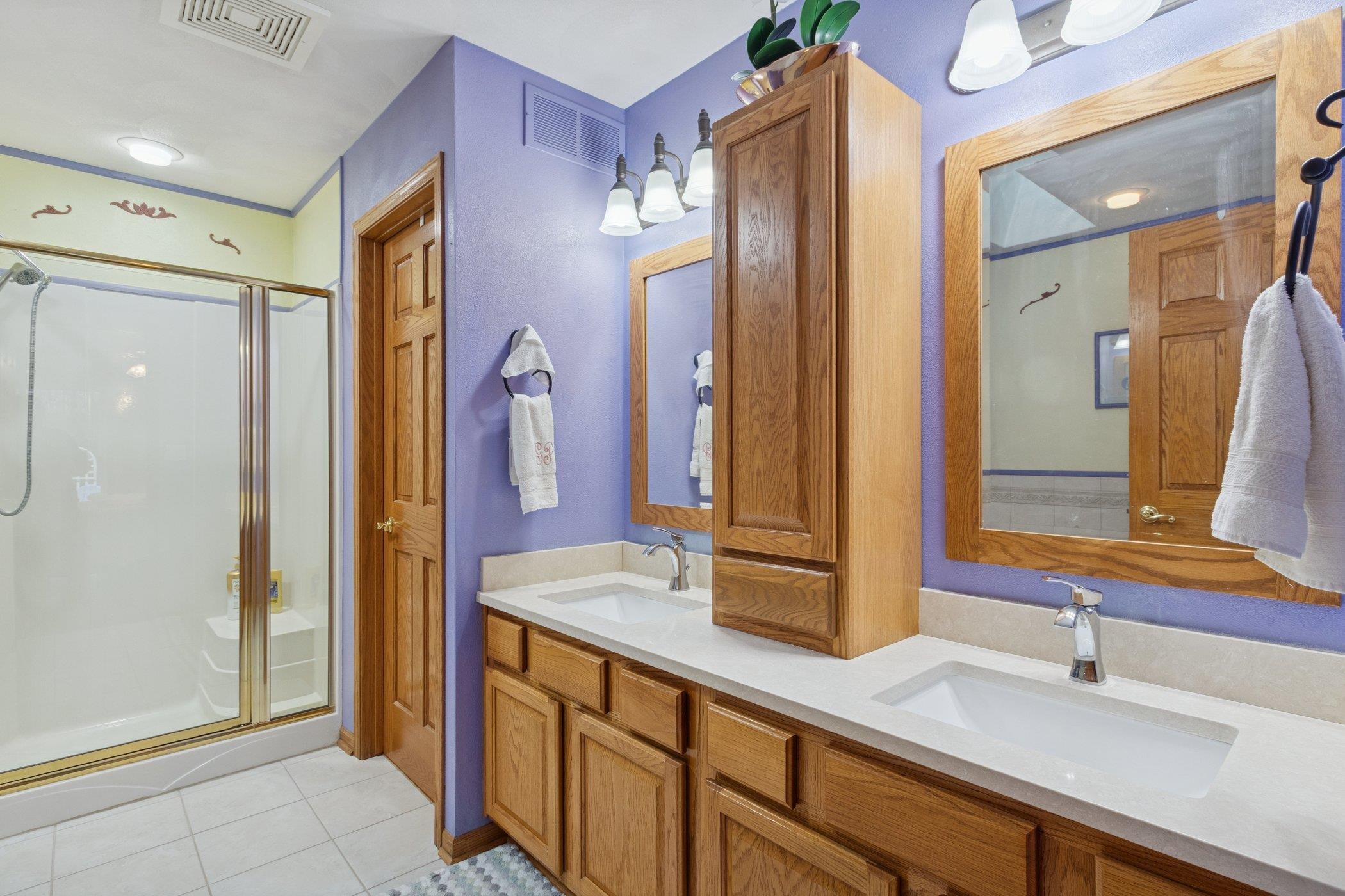 638 Merrion Road Roscoe, IL 61073 - Photo 21 of 64 a bathroom with a double vanity sink mirror and double