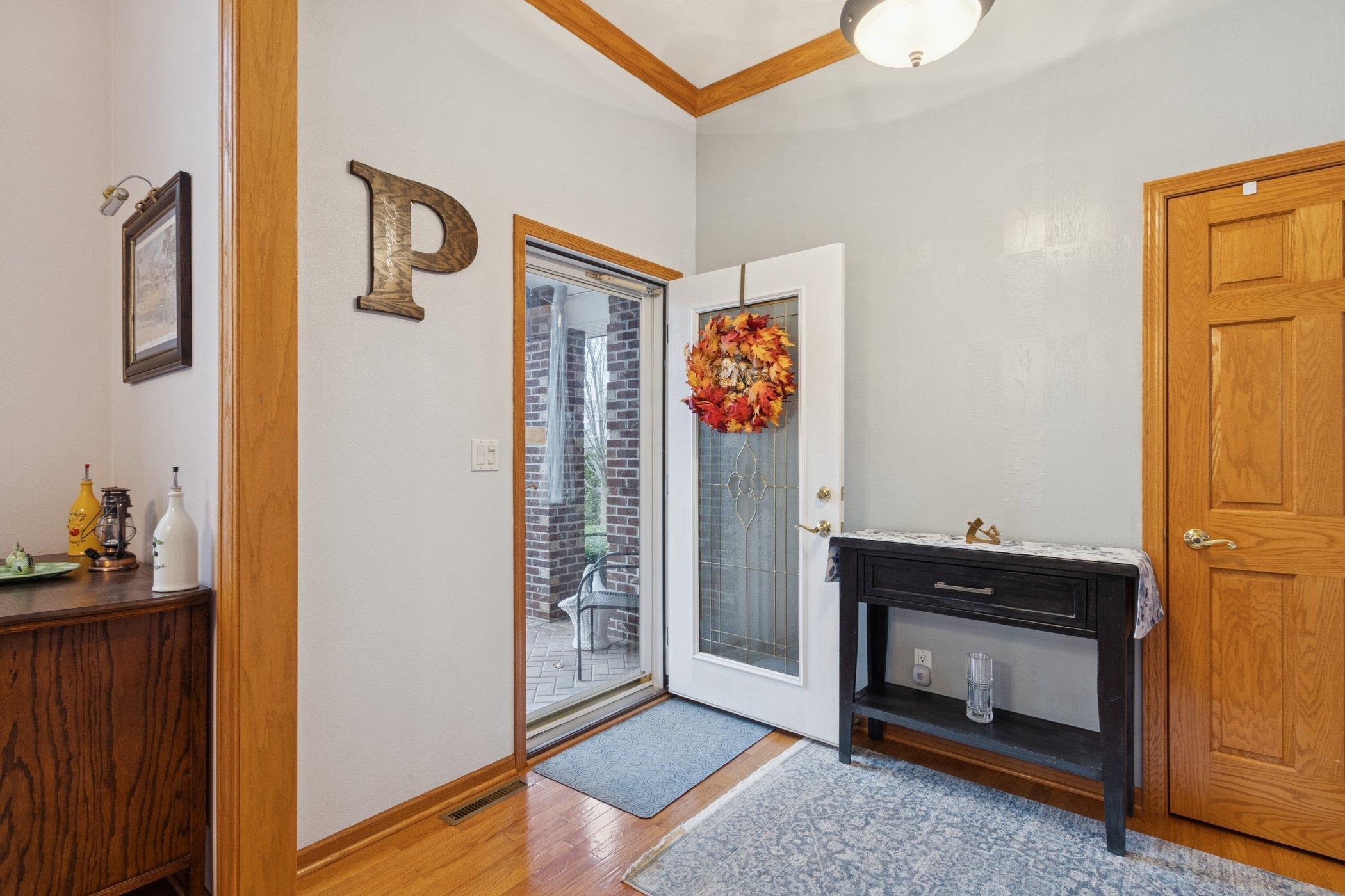 638 Merrion Road Roscoe, IL 61073 - Photo 62 of 64 a view of an entryway and livingroom in right side