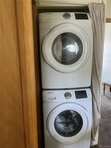 a view of a car parked in front of a house