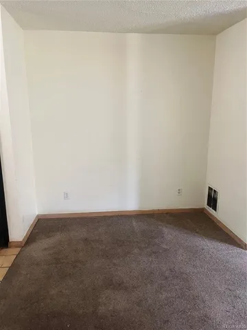 a kitchen with a sink appliances and cabinets