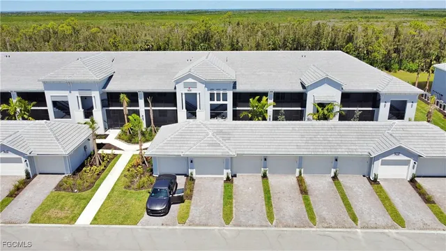 a aerial view of a house with swimming pool