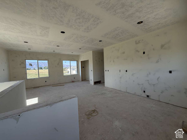338 West 3400 South Logan, UT 84321 - Photo 36 of 40 Spacious interior featuring multiple windows, recessed lighting, and an open layout