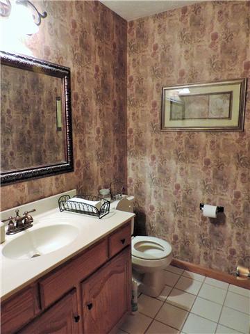 2920 Sweethome Road Chapmansboro, TN 37035 - Photo 12 of 20 Half-bath on main level, located just off living room.