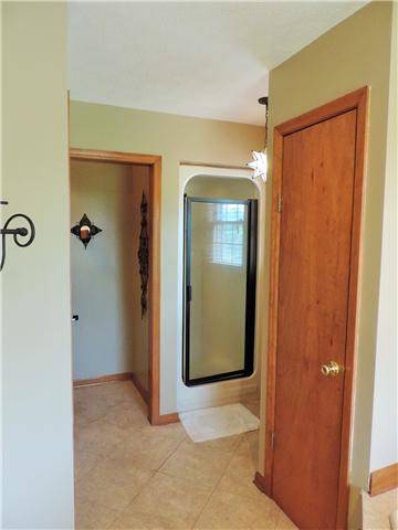 2920 Sweethome Road Chapmansboro, TN 37035 - Photo 14 of 20 This home has an incredible owner's bath. Shown here: separate shower; separate commode area with its own interior door; linen closet. Not featured in this photo is a large walk-in closet with two separate access doors.