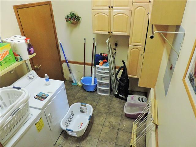 2920 Sweethome Road Chapmansboro, TN 37035 - Photo 10 of 20 Sunken utility room located just inside garage and adjacent to sunroom. Built-in cabinets.