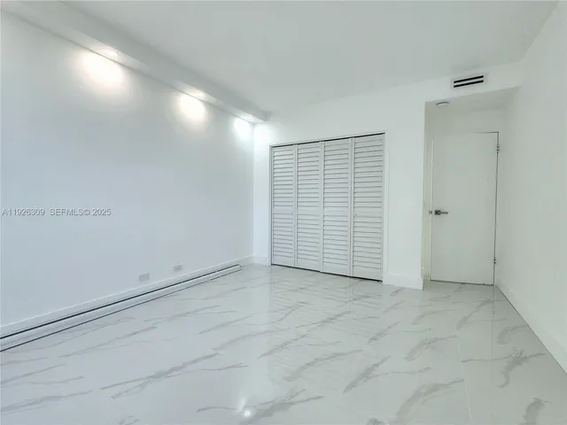 a bathroom with a sink a toilet and bathtub