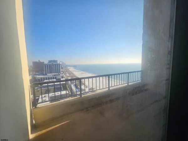 a view of balcony with furniture