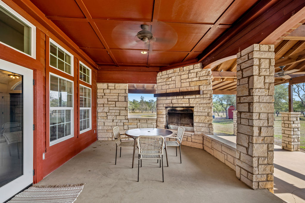 2795 Highway 290 Dripping Springs, TX 78620 - Photo 24 of 40 a outdoor space with the couches and dining table