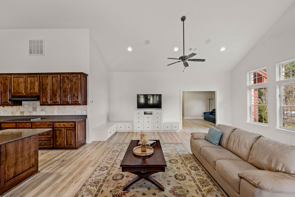2795 Highway 290 Dripping Springs, TX 78620 - Photo 3 of 40 a living room with furniture and a wooden floor