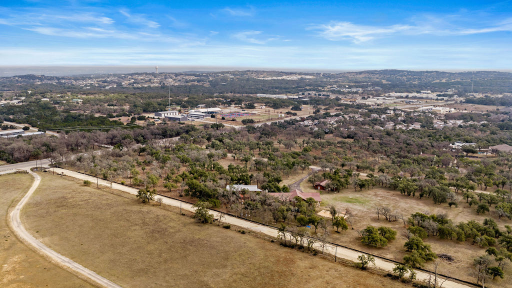 2795 Highway 290 Dripping Springs, TX 78620 - Photo 39 of 40 an aerial view of residential houses with city view