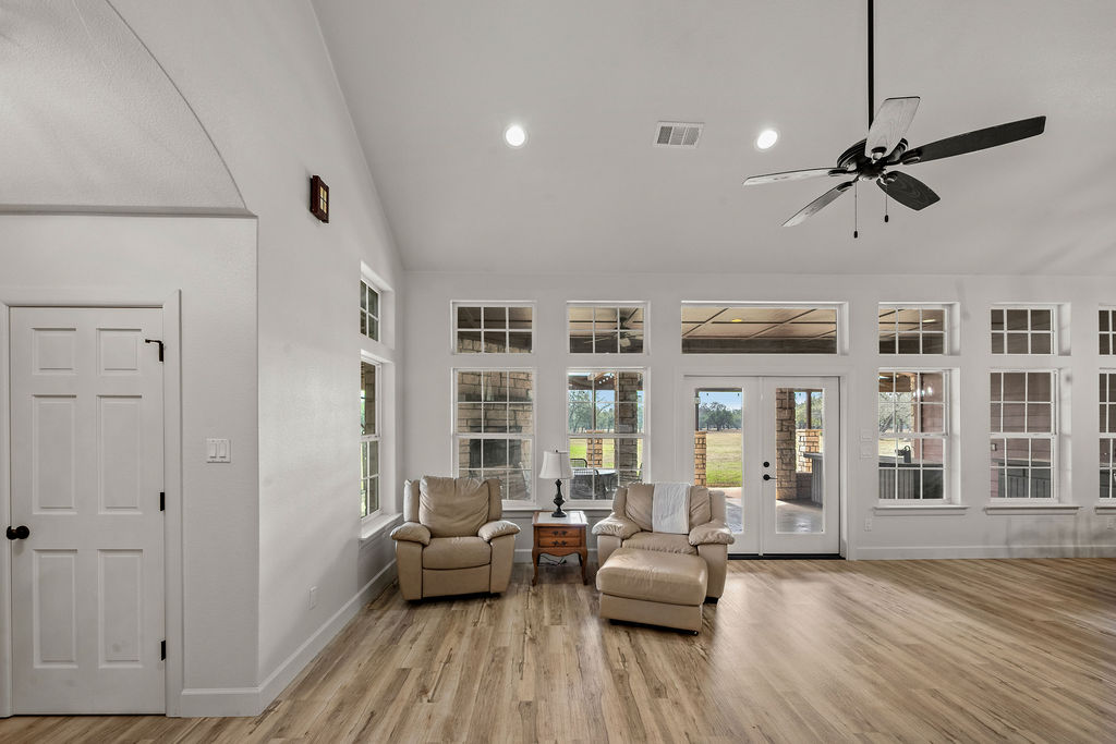 2795 Highway 290 Dripping Springs, TX 78620 - Photo 4 of 40 a living room with furniture window and wooden floor
