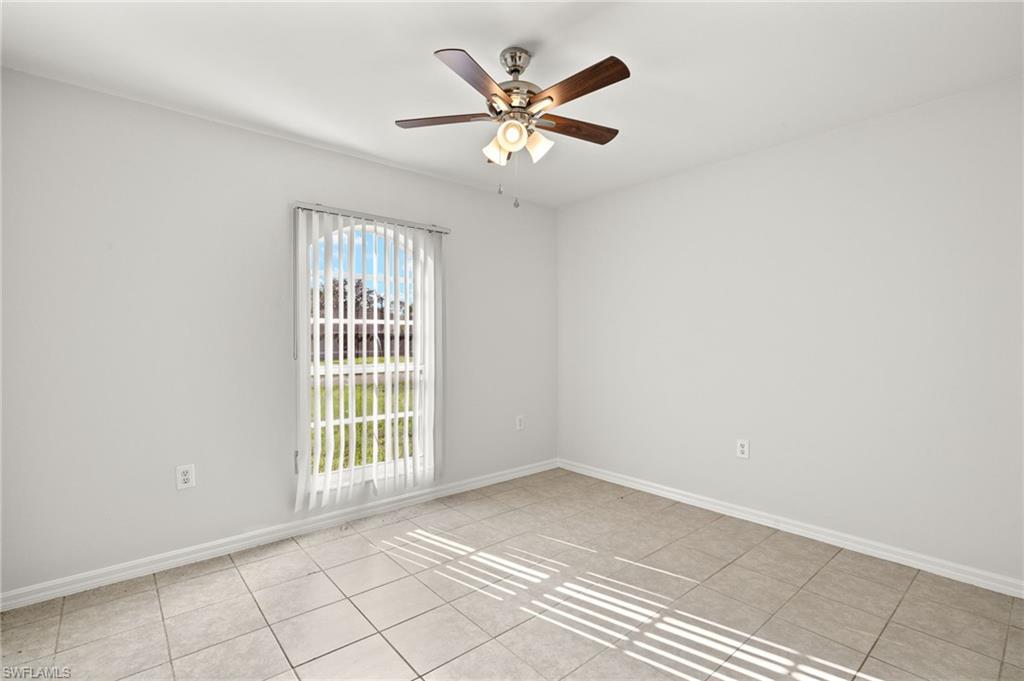 18396 Heather Road Fort Myers, FL 33967 - Photo 15 of 26 a view of an empty room with a window