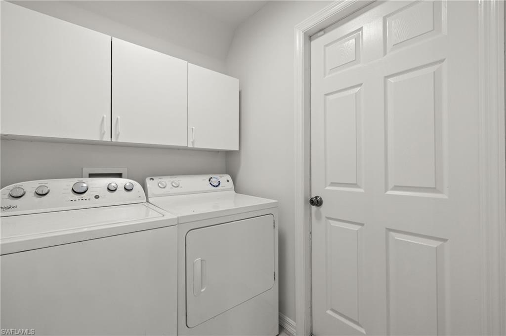 18396 Heather Road Fort Myers, FL 33967 - Photo 17 of 26 a view of storage room with washer and dryer