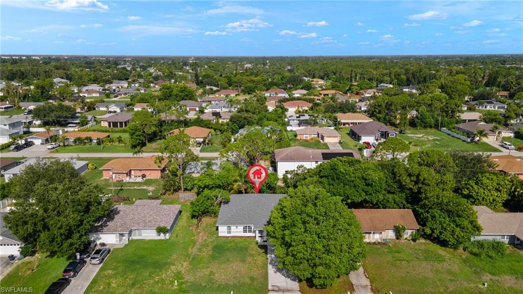 18396 Heather Road Fort Myers, FL 33967 - Photo 21 of 26 an aerial view of residential houses with outdoor space and trees