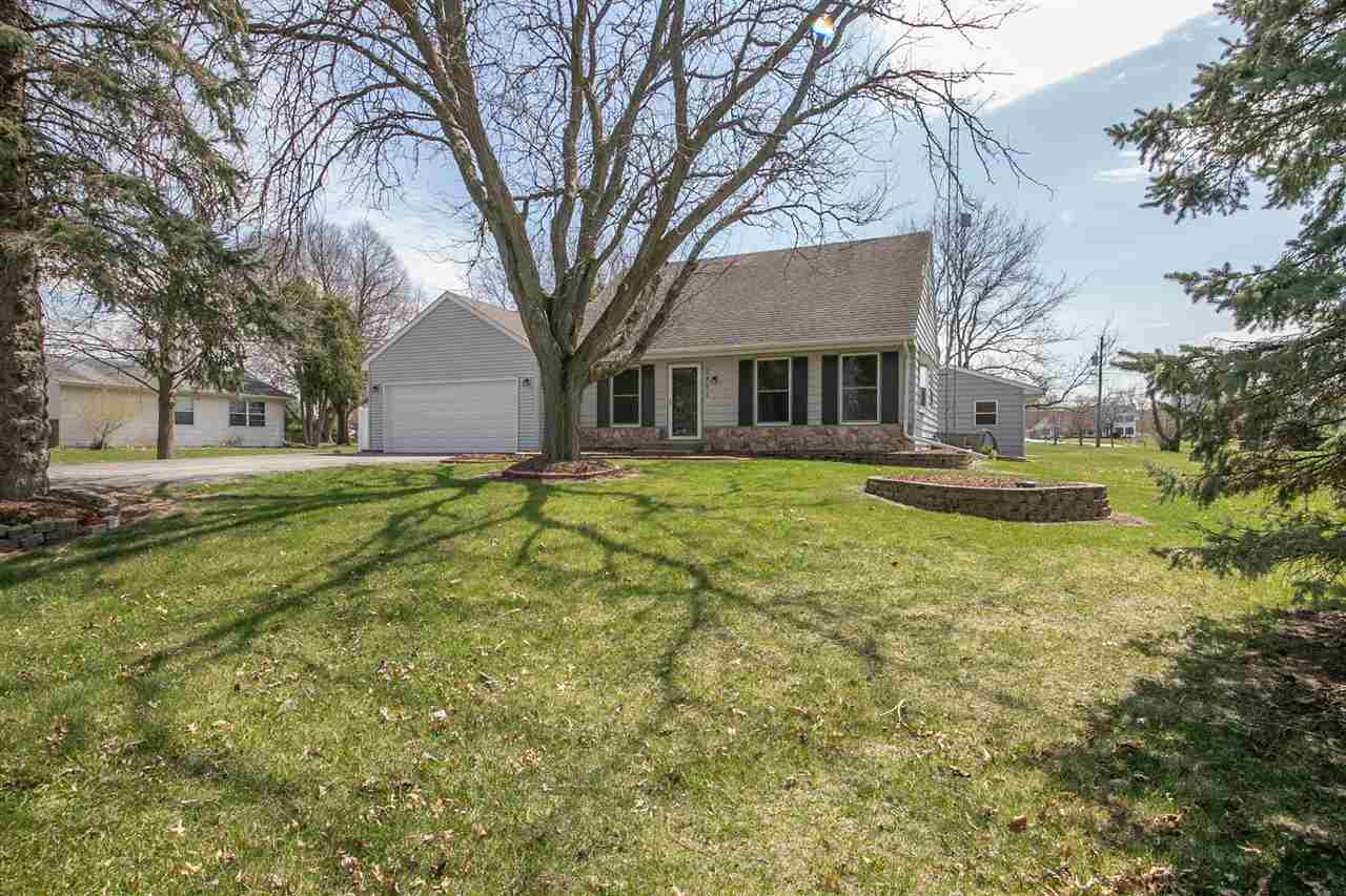 2893 Karr Road Belvidere, IL 61008 - Photo 1 of 25 a front view of house with yard and trees