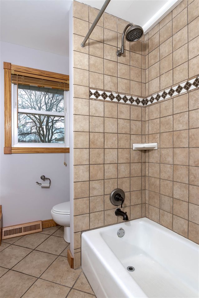 2893 Karr Road Belvidere, IL 61008 - Photo 14 of 25 a bathroom with a toilet and shower
