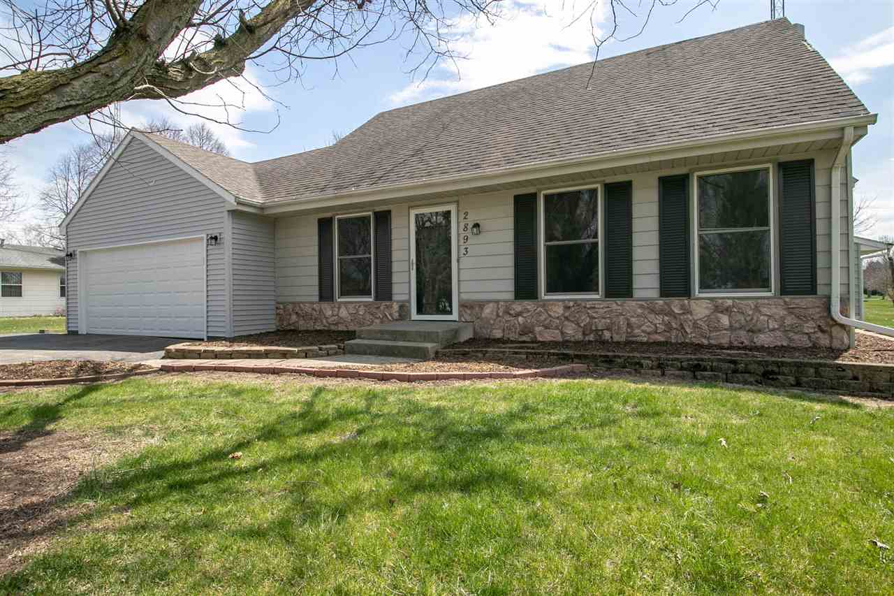 2893 Karr Road Belvidere, IL 61008 - Photo 25 of 25 a front view of a house with a yard and porch