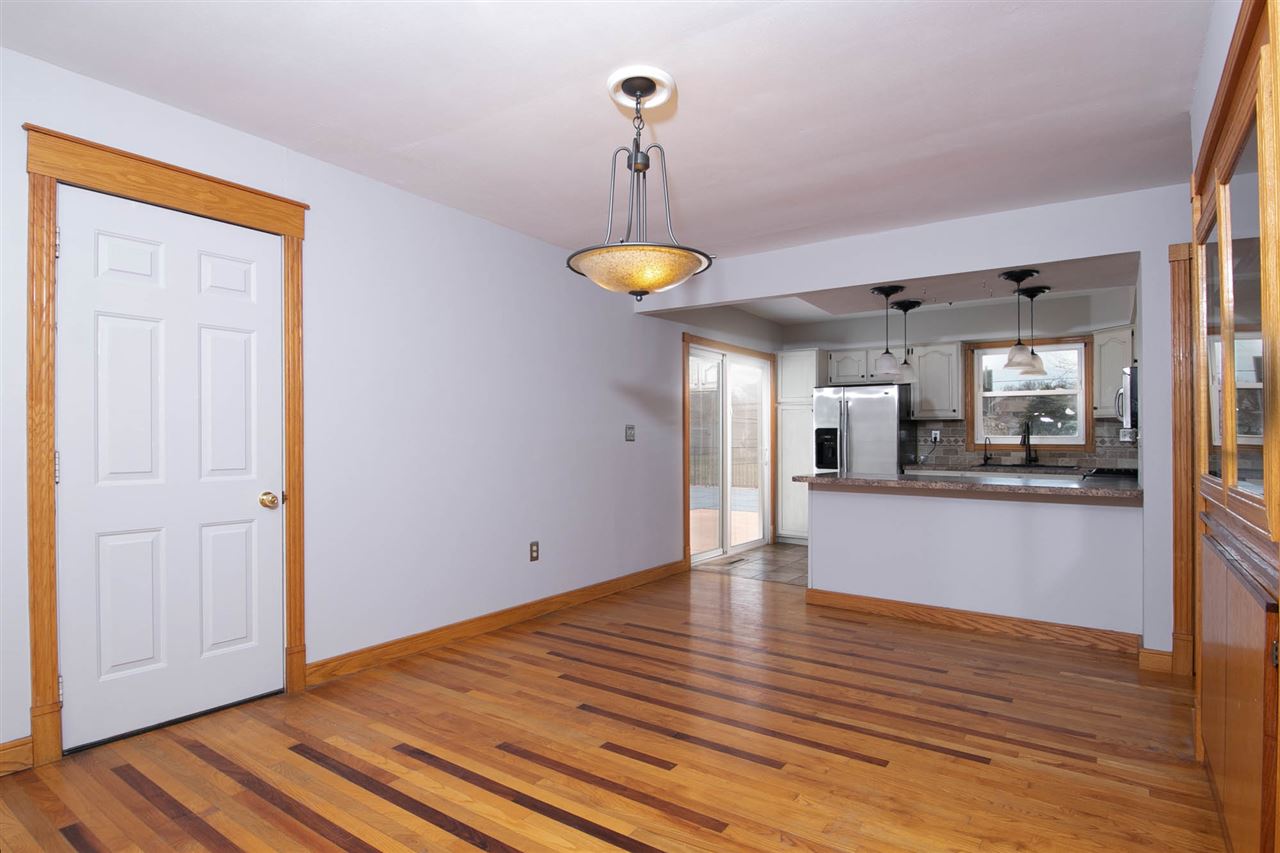 2893 Karr Road Belvidere, IL 61008 - Photo 4 of 25 a view of empty room with wooden floor and fan