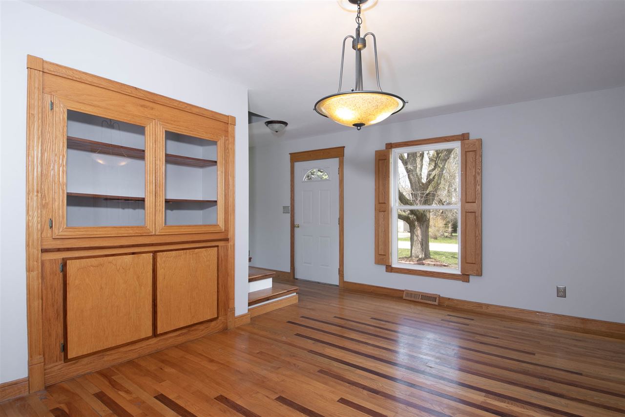 2893 Karr Road Belvidere, IL 61008 - Photo 5 of 25 a view of a room with wooden floor and a window