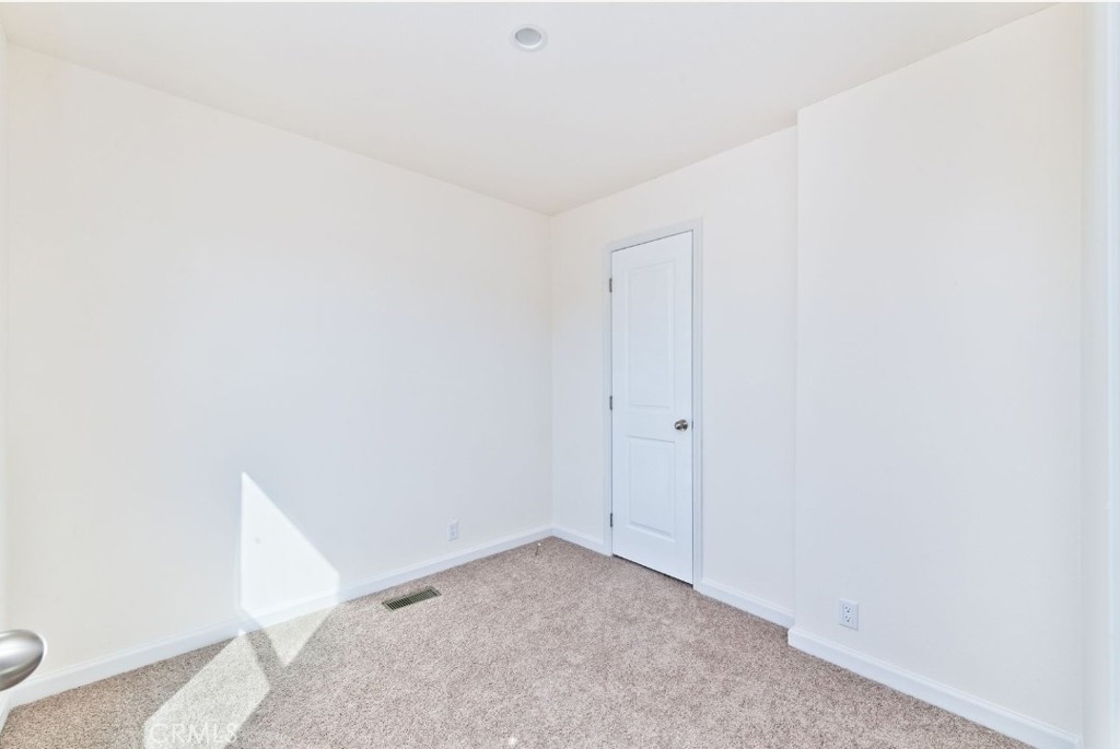 15252 Seneca Road, Unit 13 Victorville, CA 92394 - Photo 7 of 9 a view of an empty room